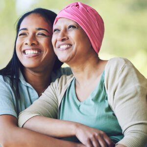 Two women hugging joyfully